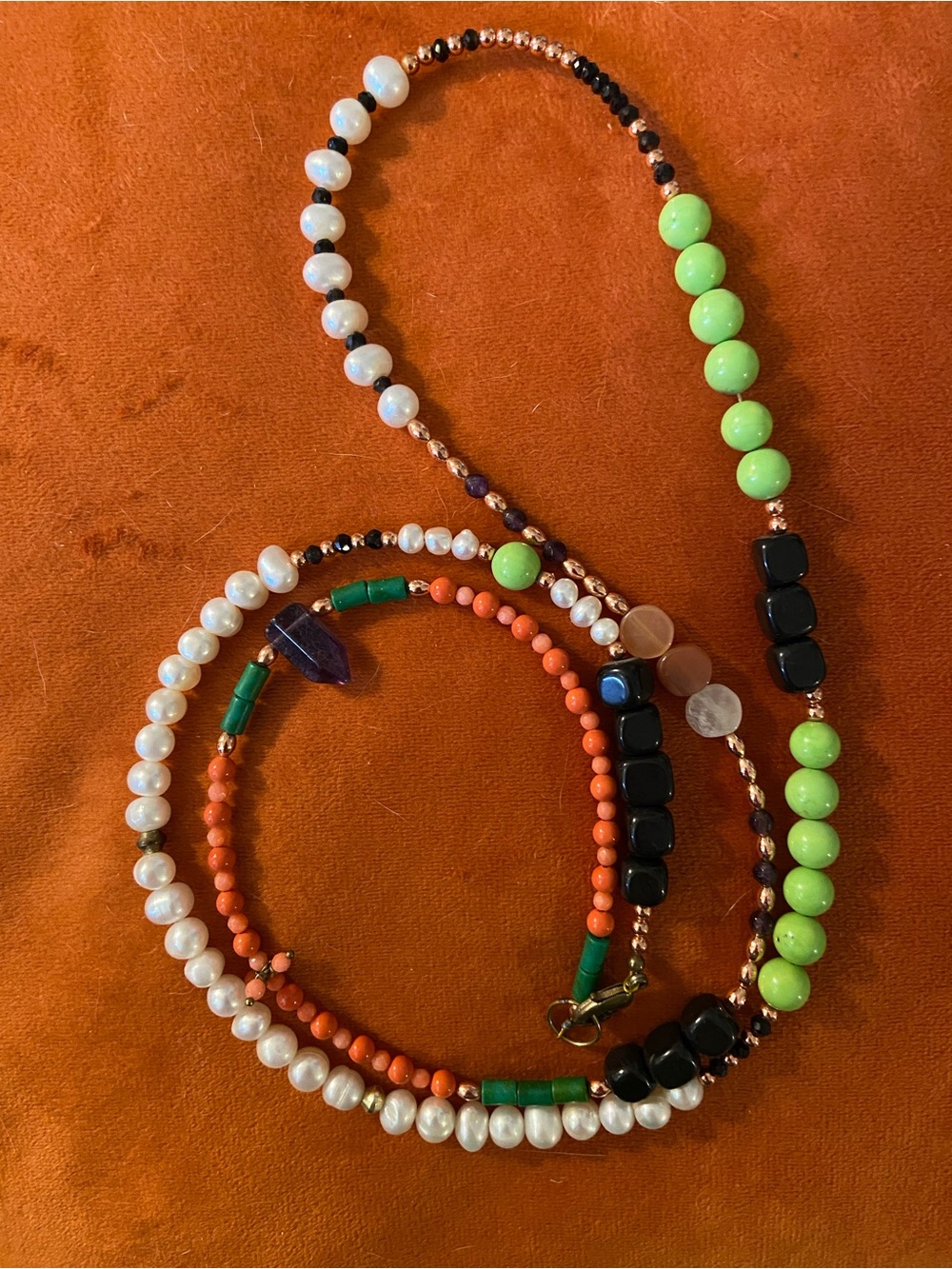 copper & pearl necklace with moonstone, black tourmaline, coral and fluorite.